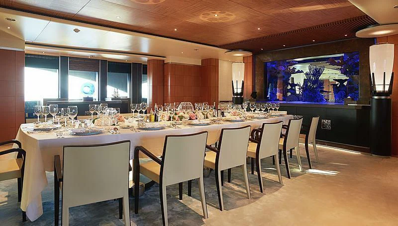 a large table with many wine glasses aboard BARBARA Yacht for Charter