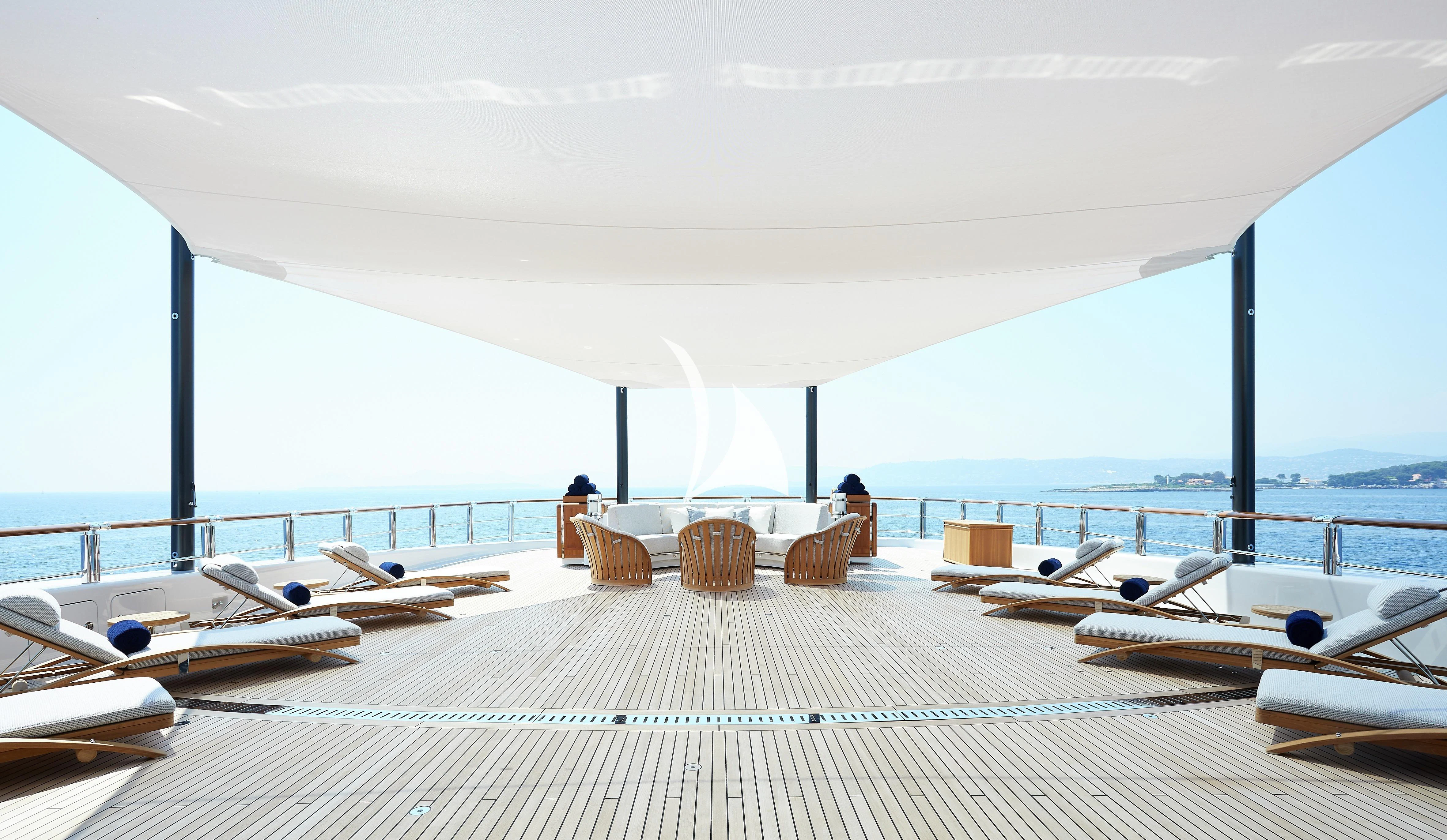 a room with a view of the ocean and boats aboard BARBARA Yacht for Charter