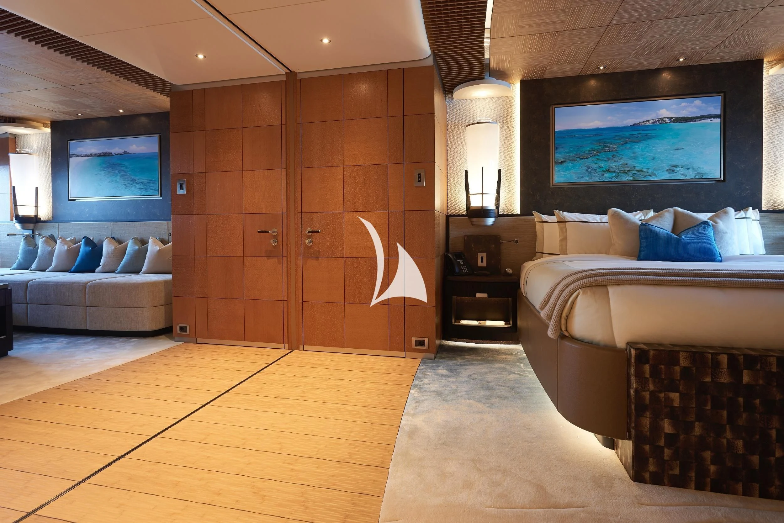 a room with a bed and a tv aboard BARBARA Yacht for Charter
