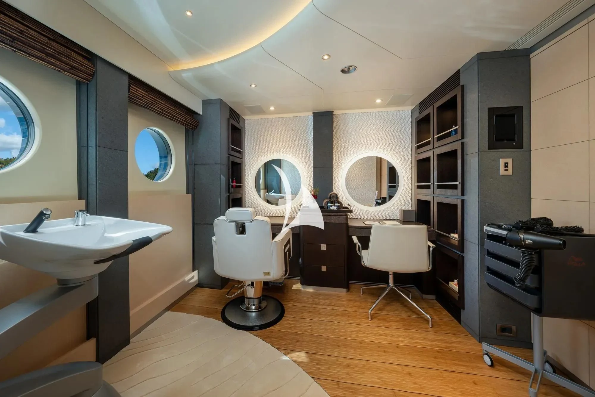 a bathroom with a sink and a mirror aboard BARBARA Yacht for Charter
