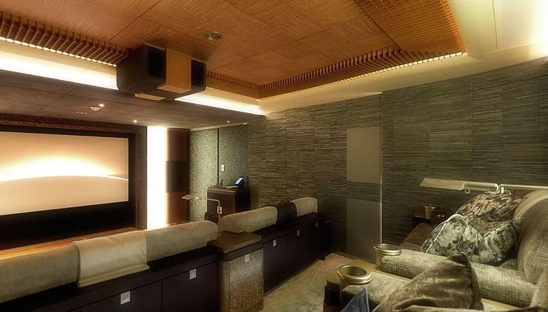 a room with a couch and a tv aboard BARBARA Yacht for Charter