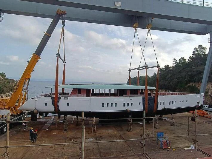 a train on the railway tracks aboard ADRI Yacht for Charter