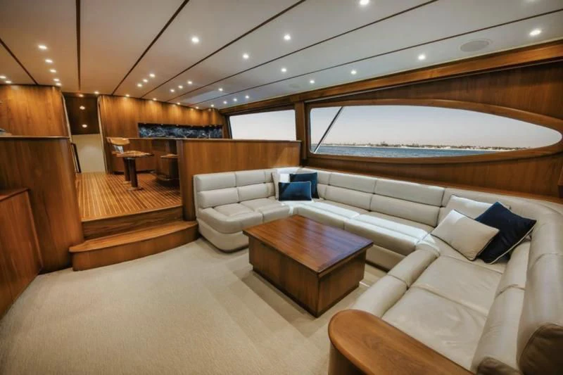 a room with a couch and a table aboard SIMPATICO Yacht for Sale