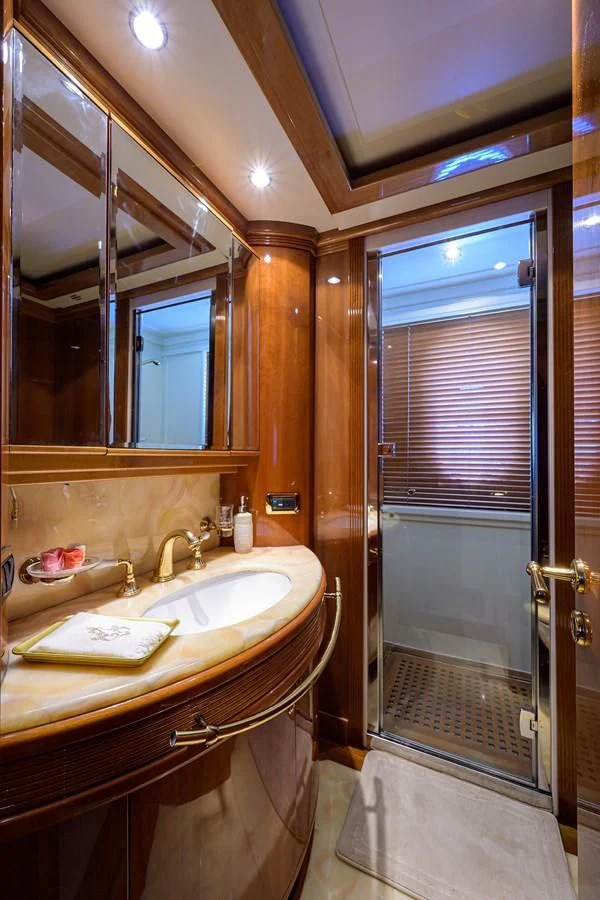 a bathroom with a sink and a shower aboard AVA Yacht for Sale