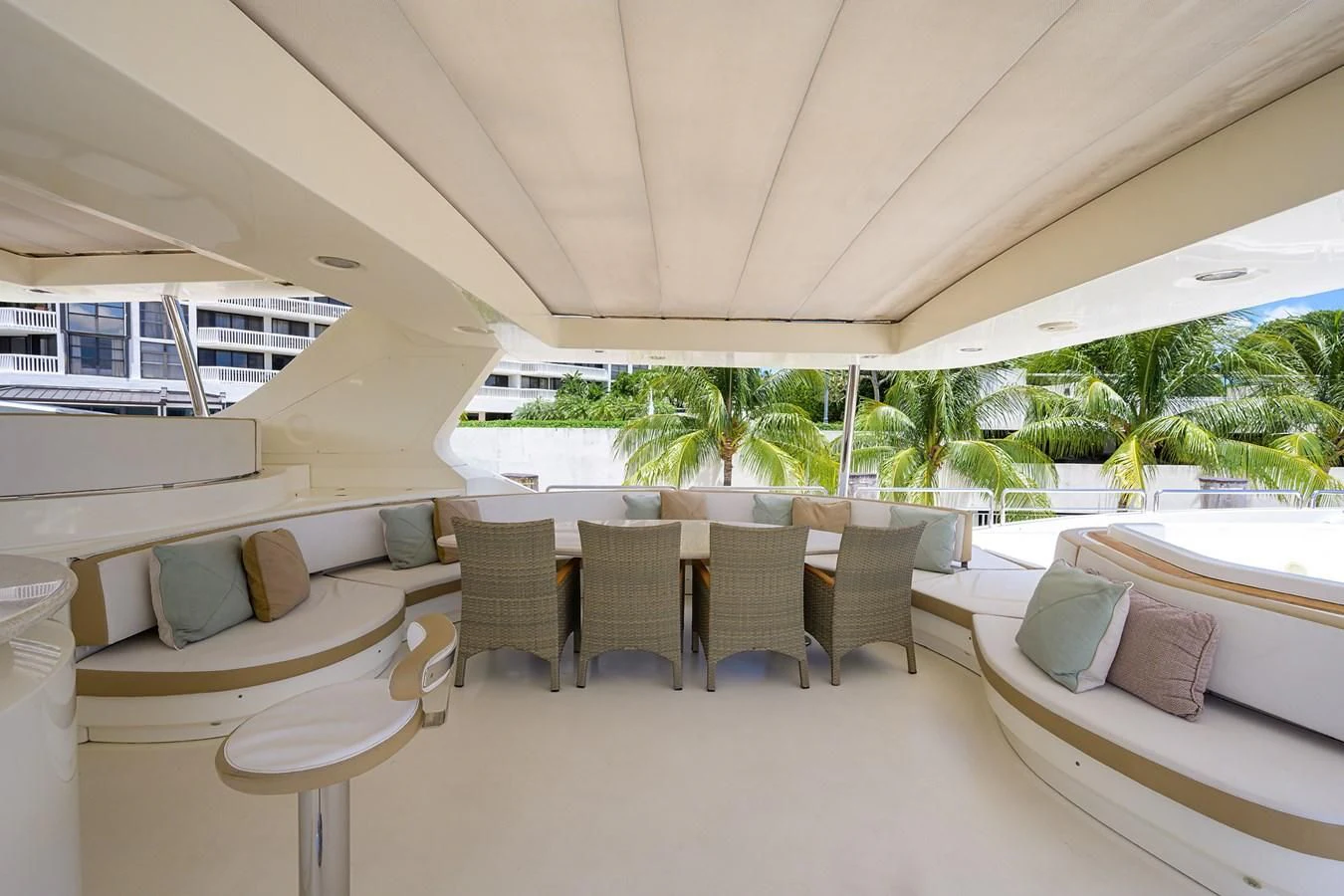 a room with a table and chairs aboard AVA Yacht for Sale