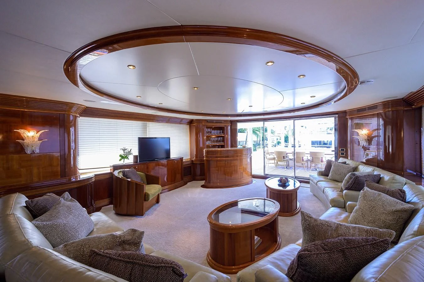 a living room with a fireplace aboard AVA Yacht for Sale