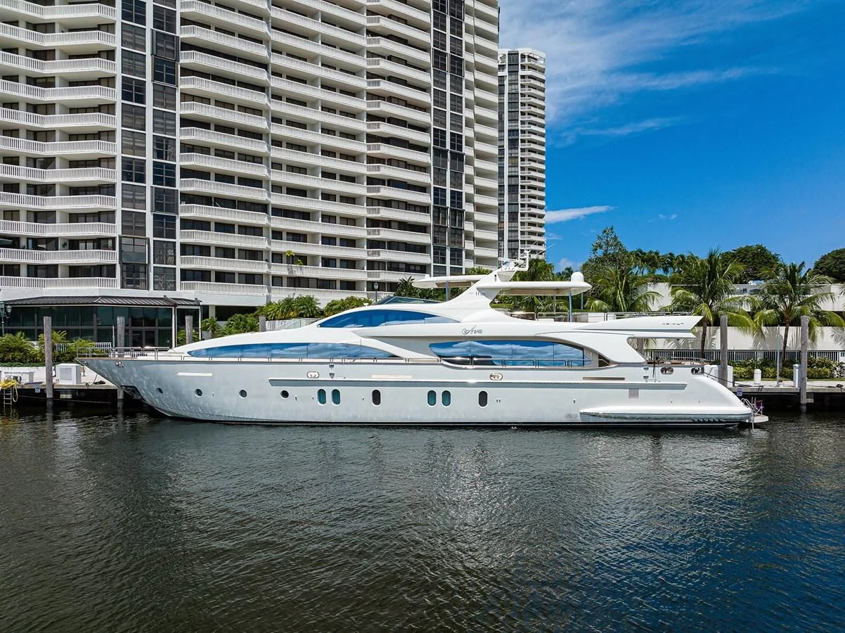a white boat in a body of water aboard AVA Yacht for Sale