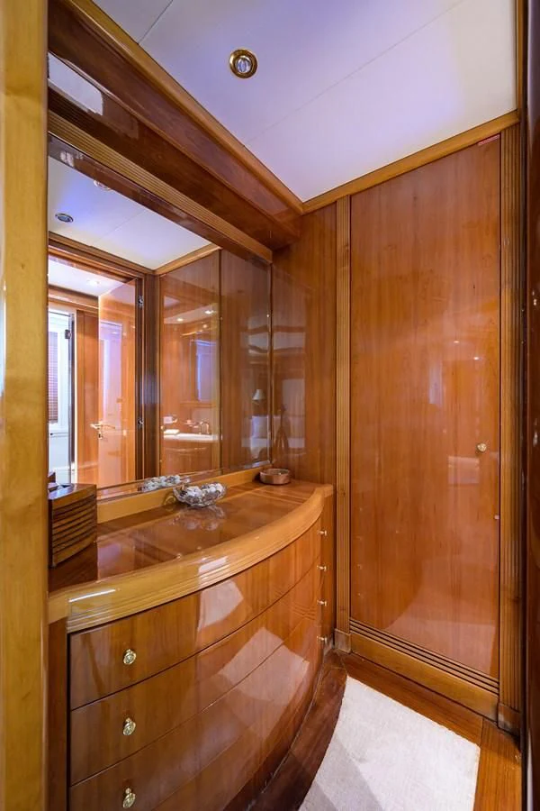 a bathroom with a large mirror aboard AVA Yacht for Sale