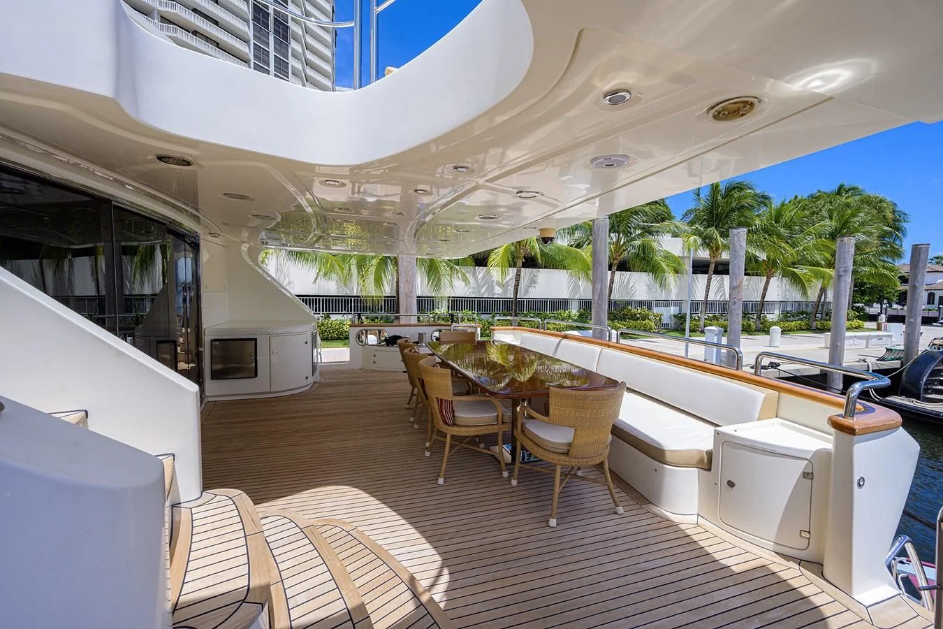 a room with a table chairs and a large window aboard AVA Yacht for Sale