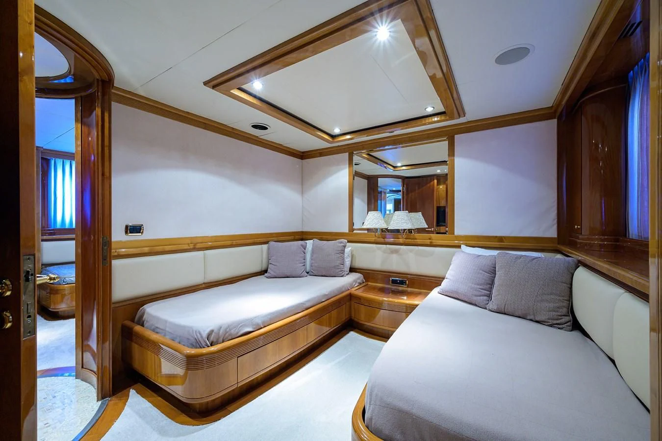 a room with two beds aboard AVA Yacht for Sale