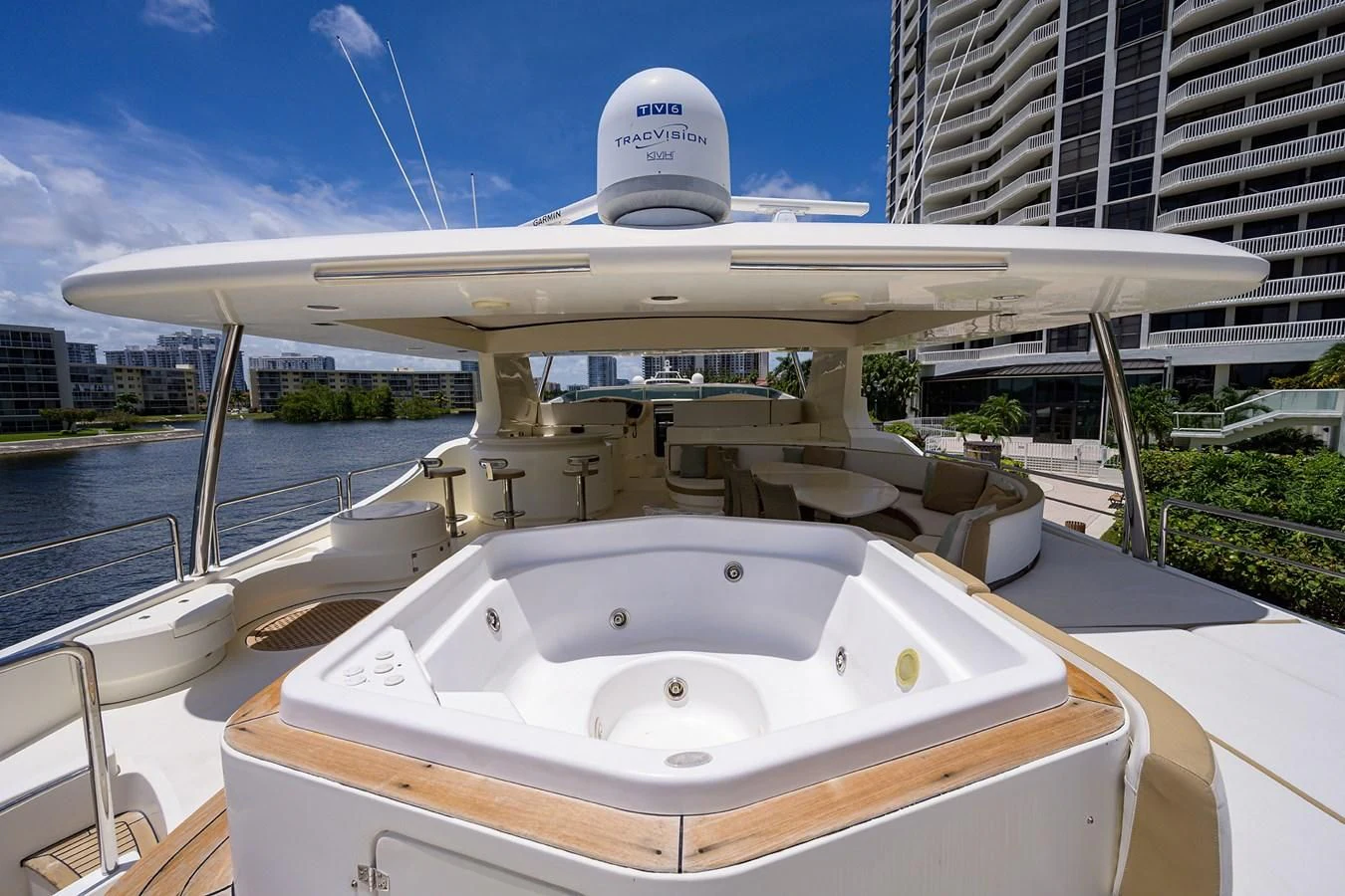 a large white boat in a large body of water aboard AVA Yacht for Sale
