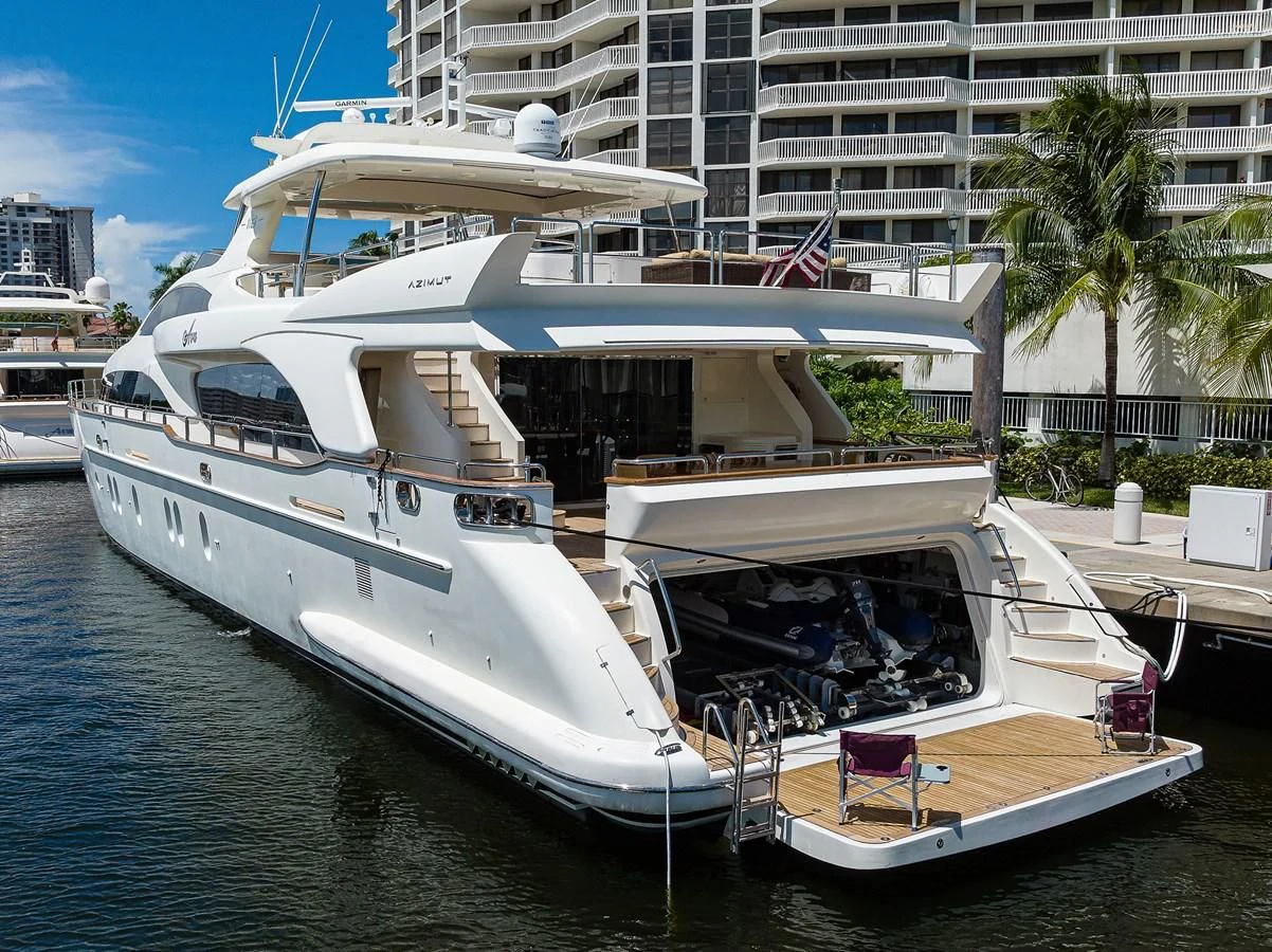 a boat docked at a pier aboard AVA Yacht for Sale