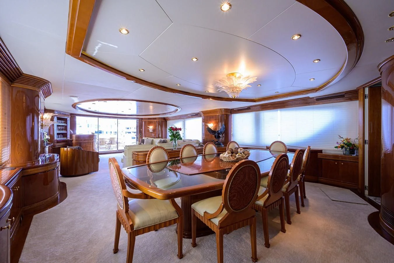 a dining room with a table and chairs aboard AVA Yacht for Sale