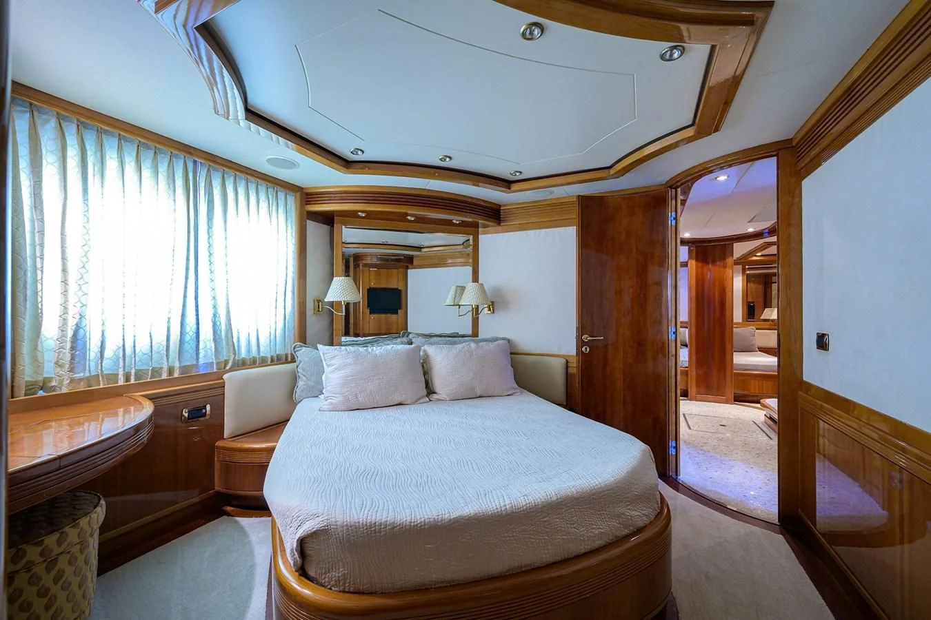 a bed in a room aboard AVA Yacht for Sale