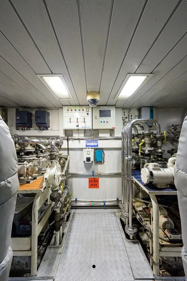 a room with machinery aboard AVA Yacht for Sale