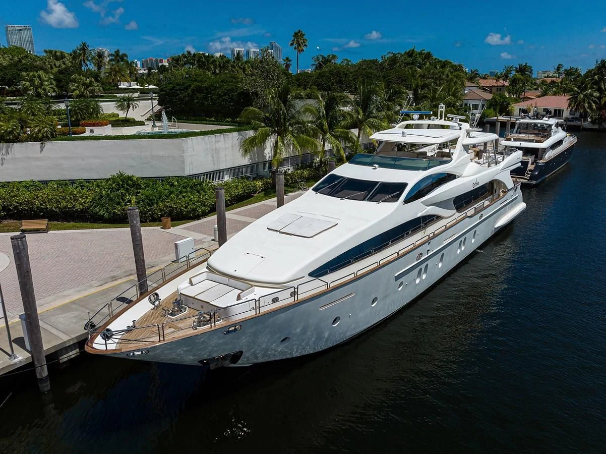 a boat docked at a pier aboard AVA Yacht for Sale
