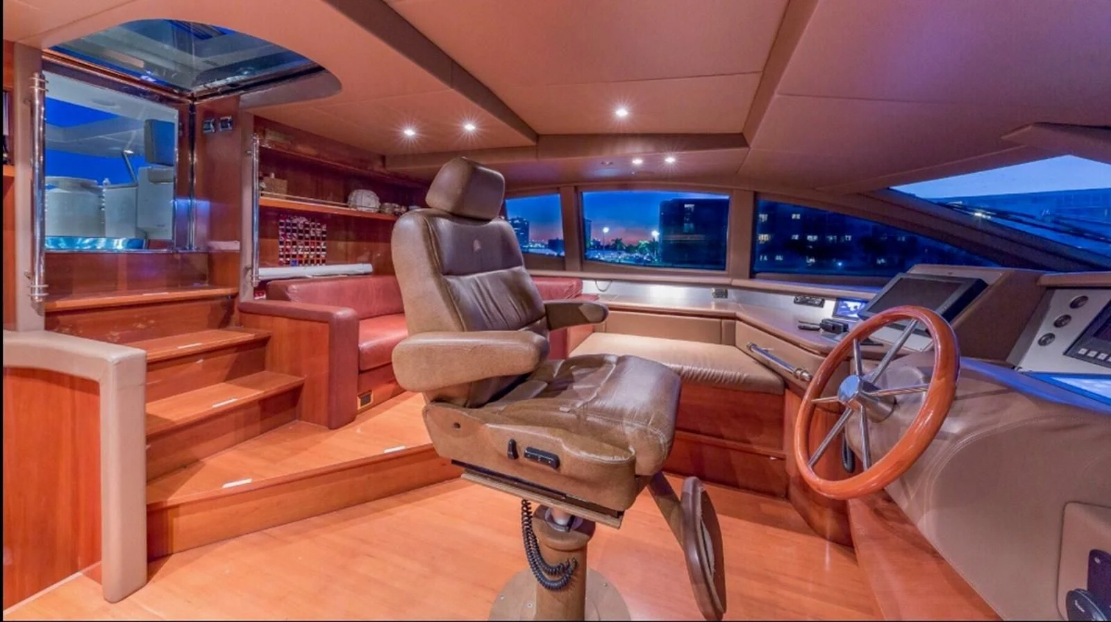 a leather chair in a room aboard AVA Yacht for Sale