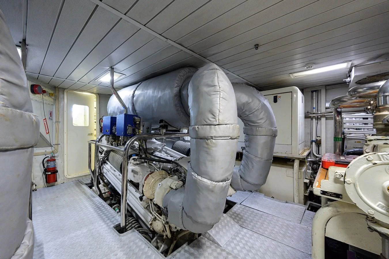 a large factory with large pipes aboard AVA Yacht for Sale