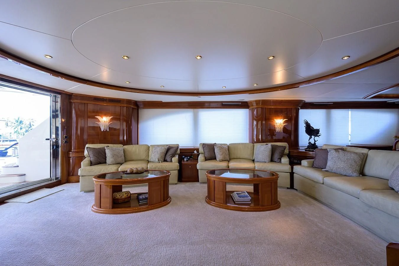 a living room with a couch and a coffee table aboard AVA Yacht for Sale