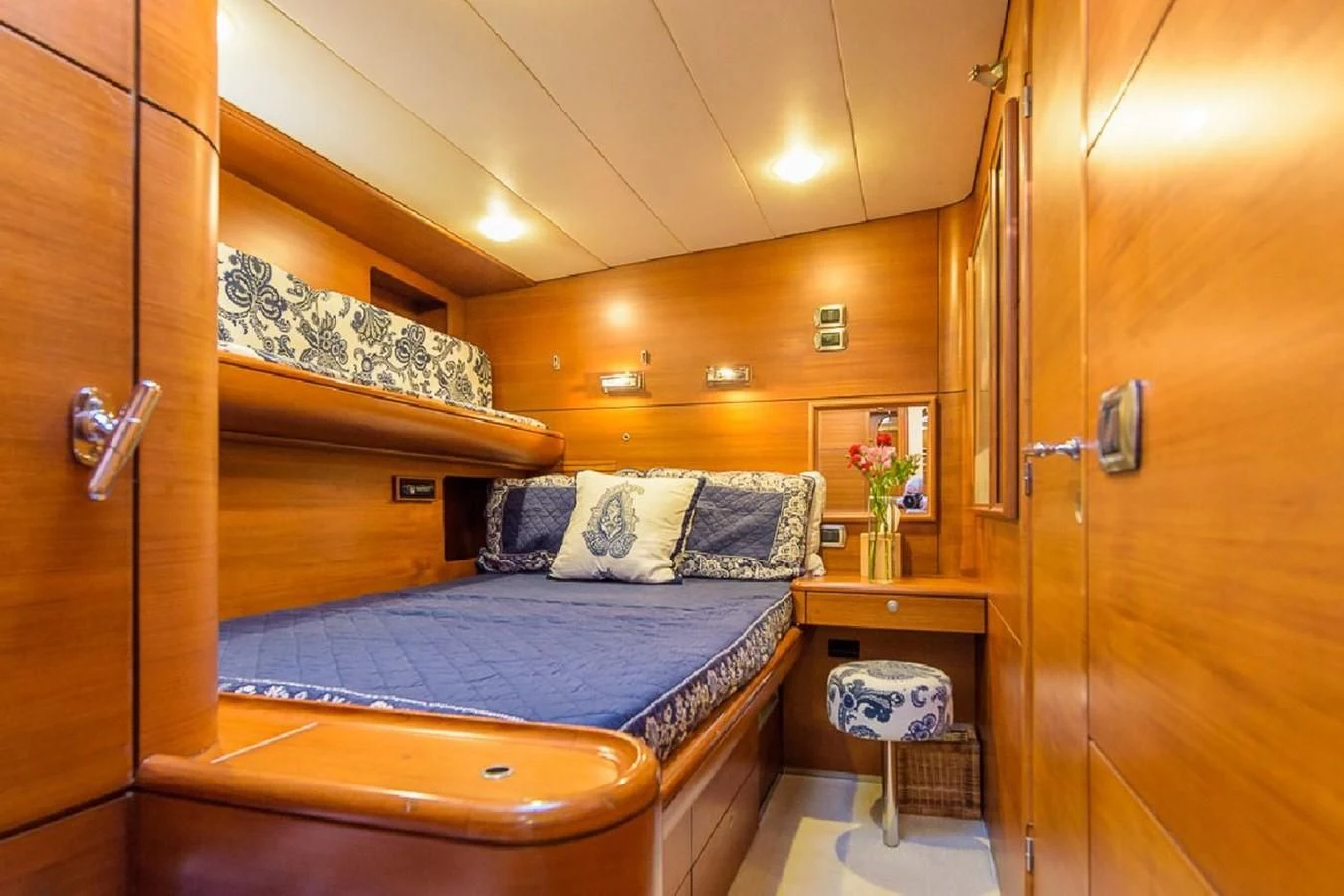 a bed in a room aboard ZANZIBAR Yacht for Sale