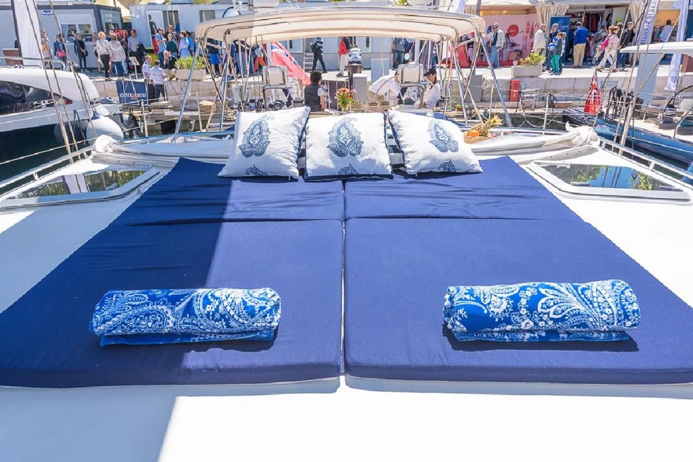 a group of blue and white painted boats on a dock aboard ZANZIBAR Yacht for Sale