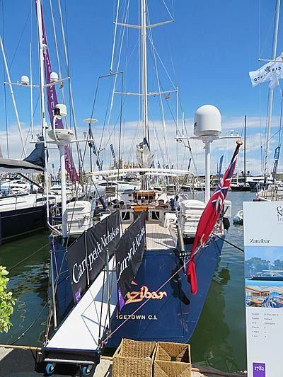 a boat docked at a pier aboard ZANZIBAR Yacht for Sale