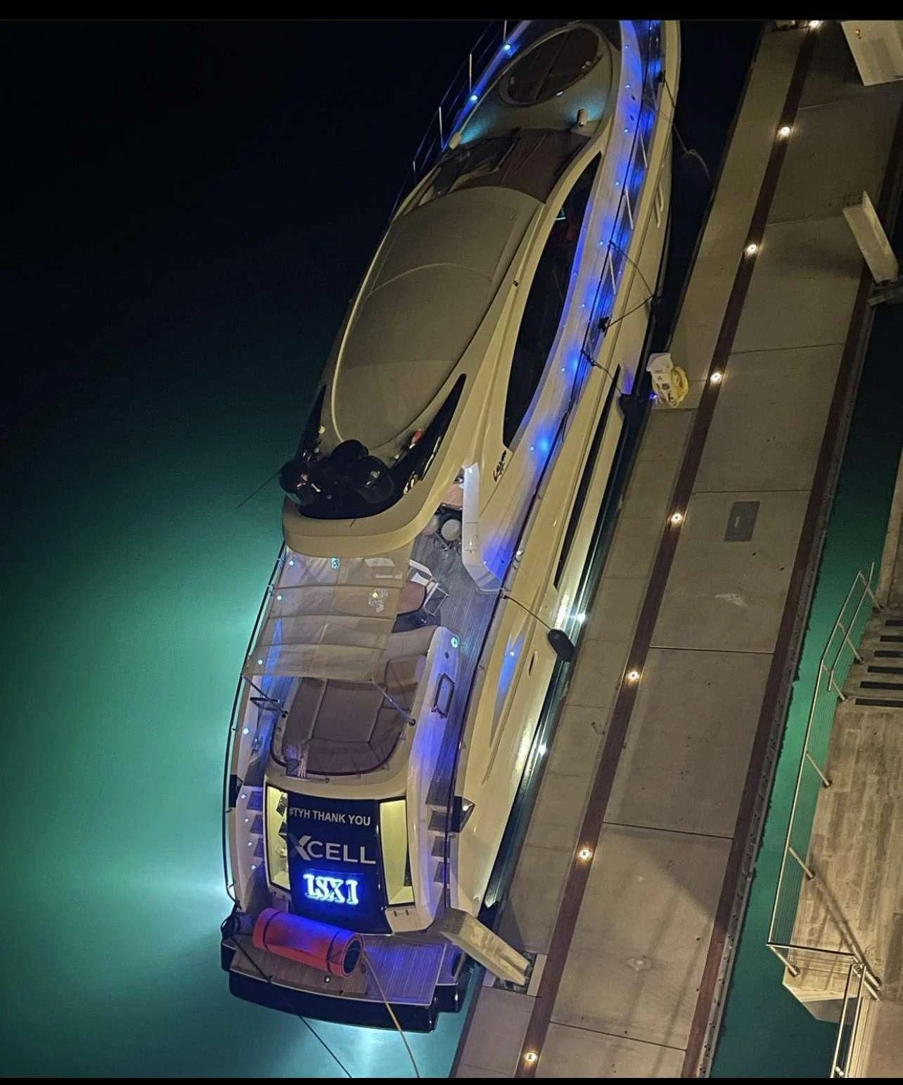 a large vehicle with a large display aboard XCELL Yacht for Sale