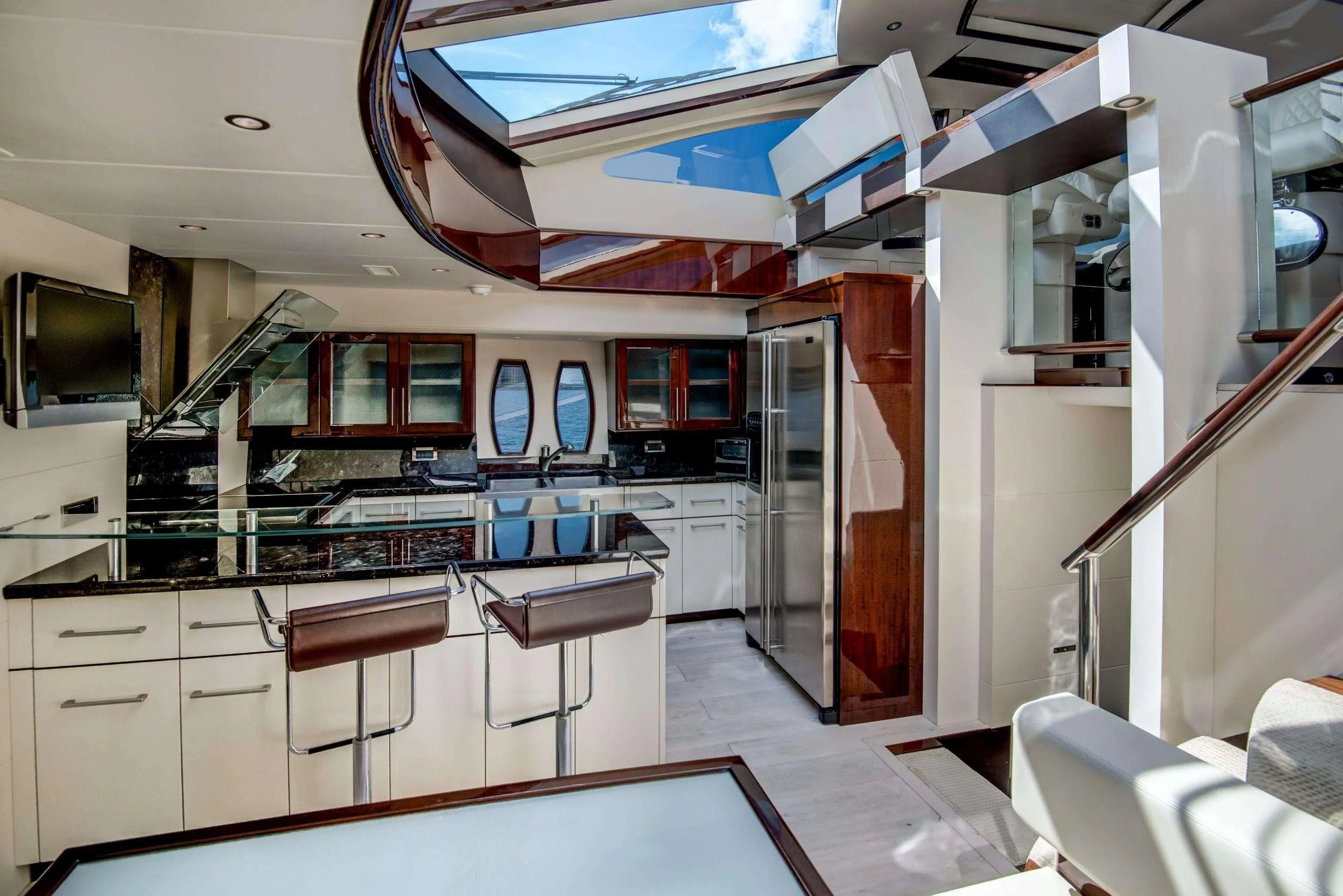 a kitchen with a large island aboard XCELL Yacht for Sale