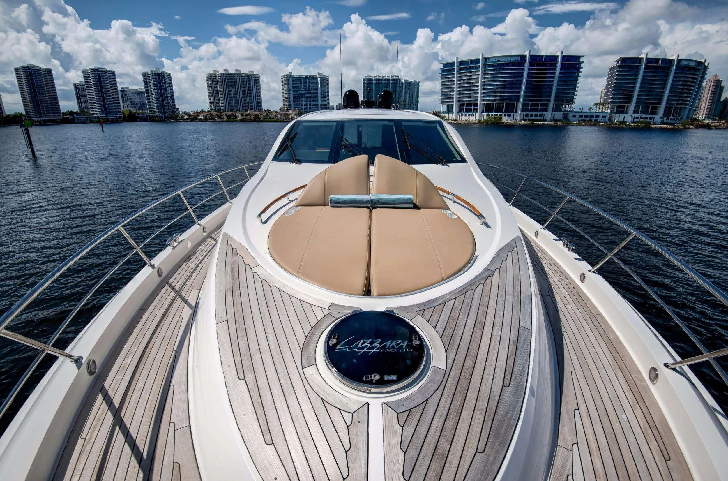 a car on a boat aboard XCELL Yacht for Sale