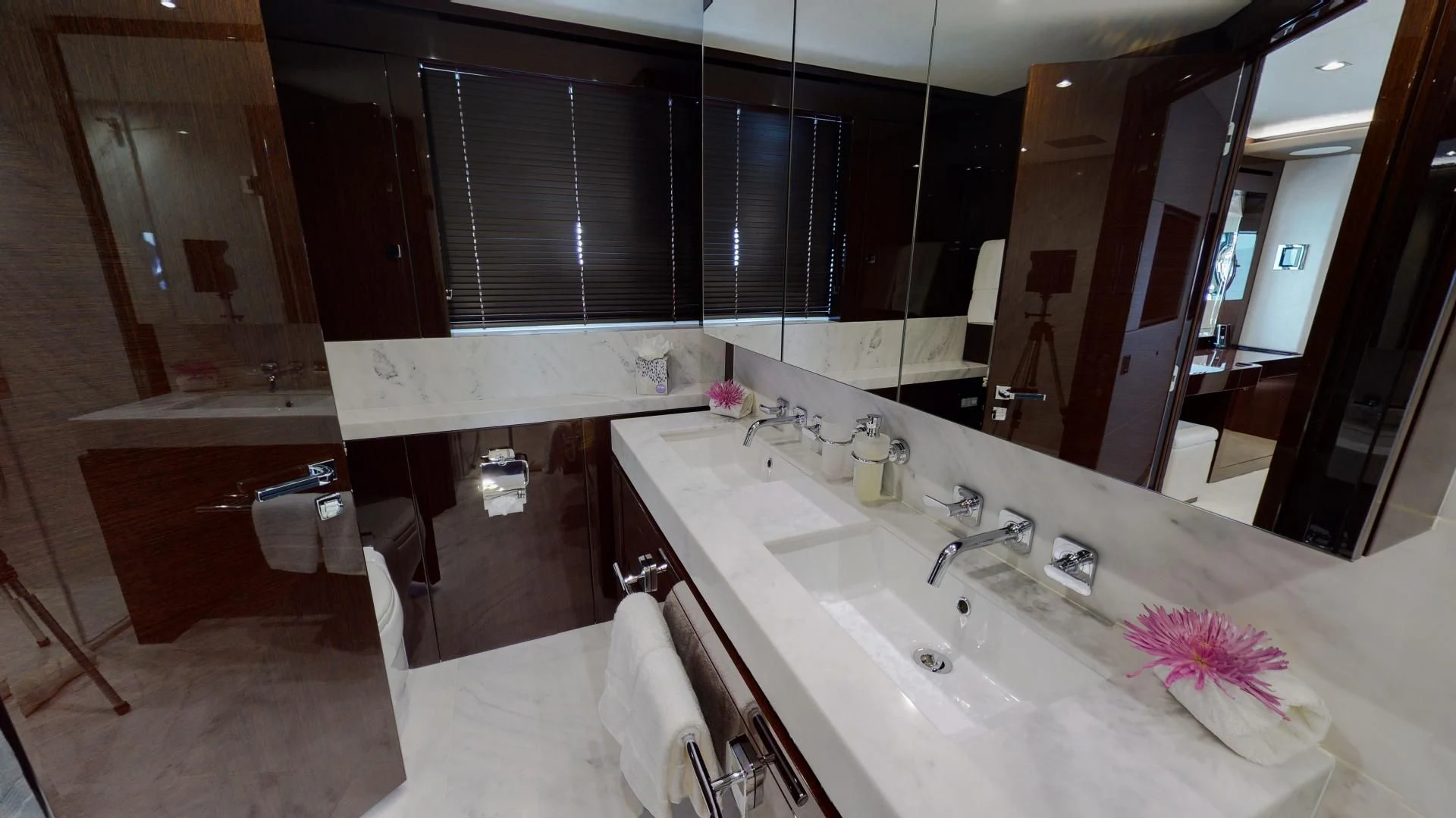 a bathroom with a bathtub sink and a mirror aboard PV 95 Yacht for Sale