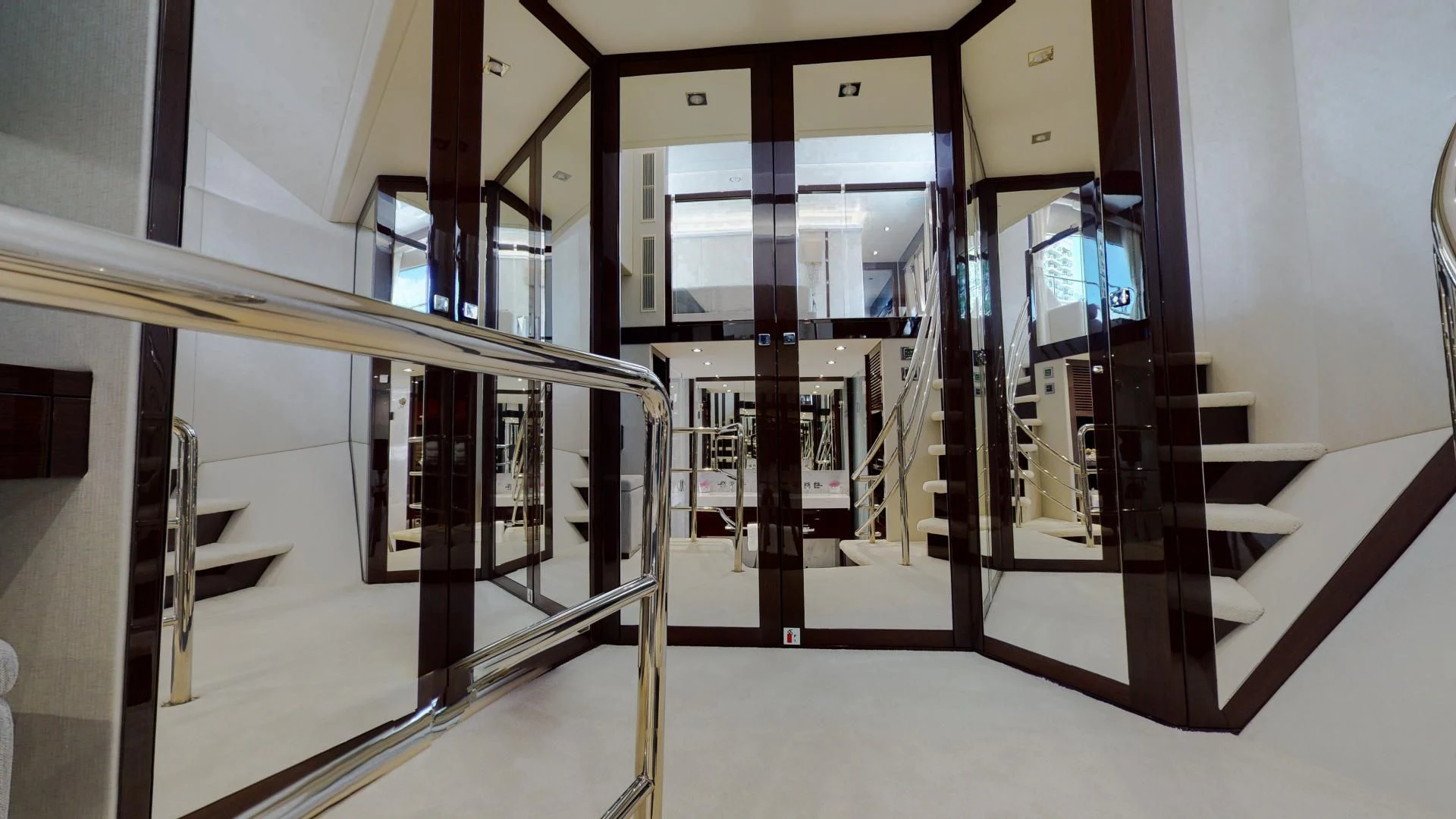a hallway with several doors aboard PV 95 Yacht for Sale