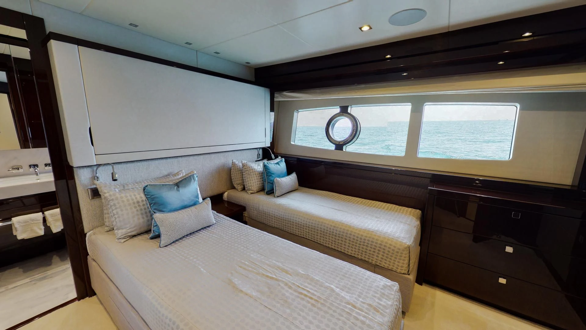 a room with a bed and a window aboard PV 95 Yacht for Sale