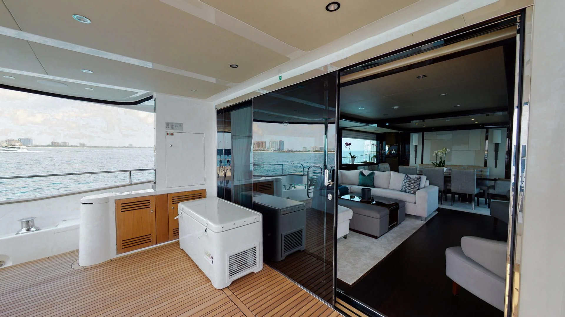 a room with a couch and a table aboard PV 95 Yacht for Sale