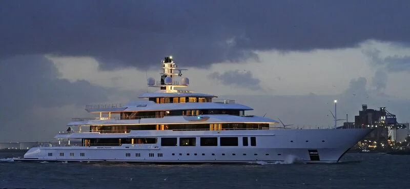 a large cruise ship in the water aboard INFINITY Yacht for Sale