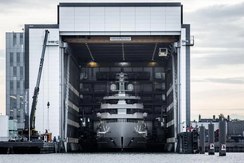 a large building with a crane aboard INFINITY Yacht for Sale