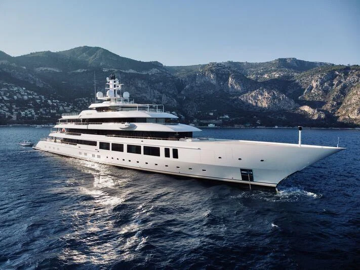 a large white ship in the water aboard INFINITY Yacht for Sale