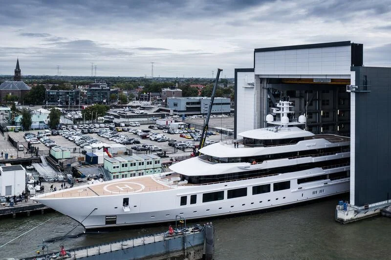 a large white ship docked aboard INFINITY Yacht for Sale