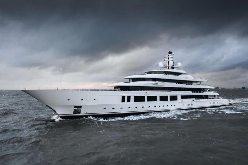 a white yacht in the water aboard INFINITY Yacht for Sale