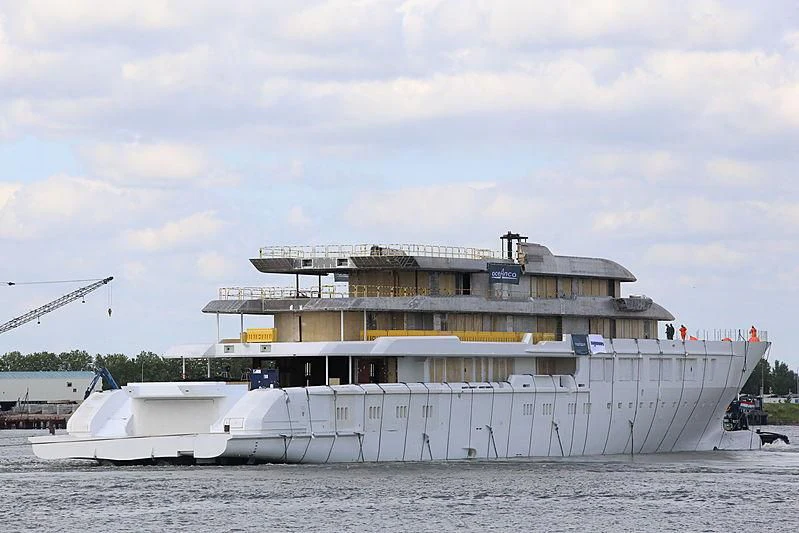 a large white boat in the water aboard INFINITY Yacht for Sale