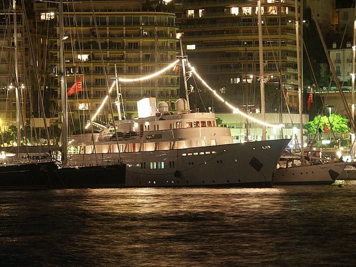a large ship in the water aboard LADY K II Yacht for Sale