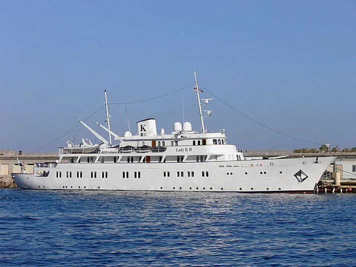 a large white boat in the water aboard LADY K II Yacht for Sale