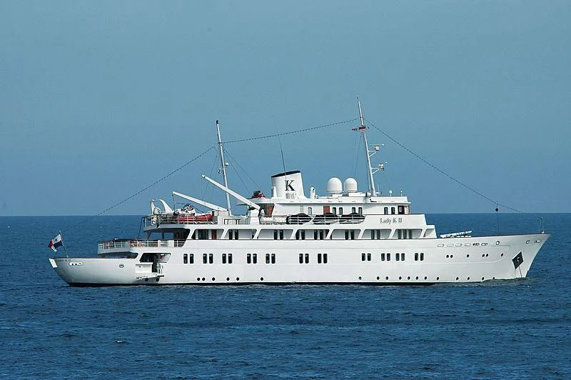 a large white boat in the water aboard LADY K II Yacht for Sale