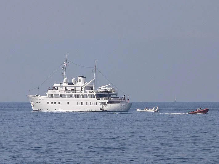 a large white boat in the water aboard LADY K II Yacht for Sale