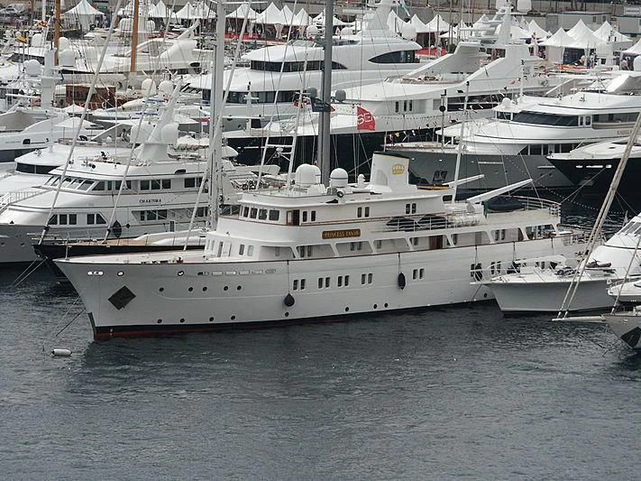 several white yachts in a harbor aboard LADY K II Yacht for Sale