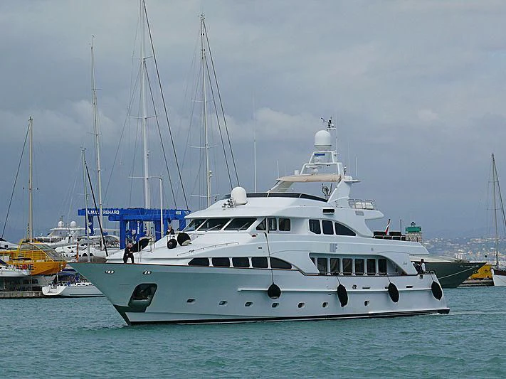 a white yacht in the water aboard BANG! Yacht for Charter