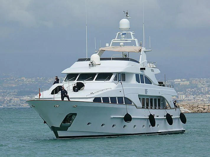 a white yacht on the water aboard BANG! Yacht for Charter