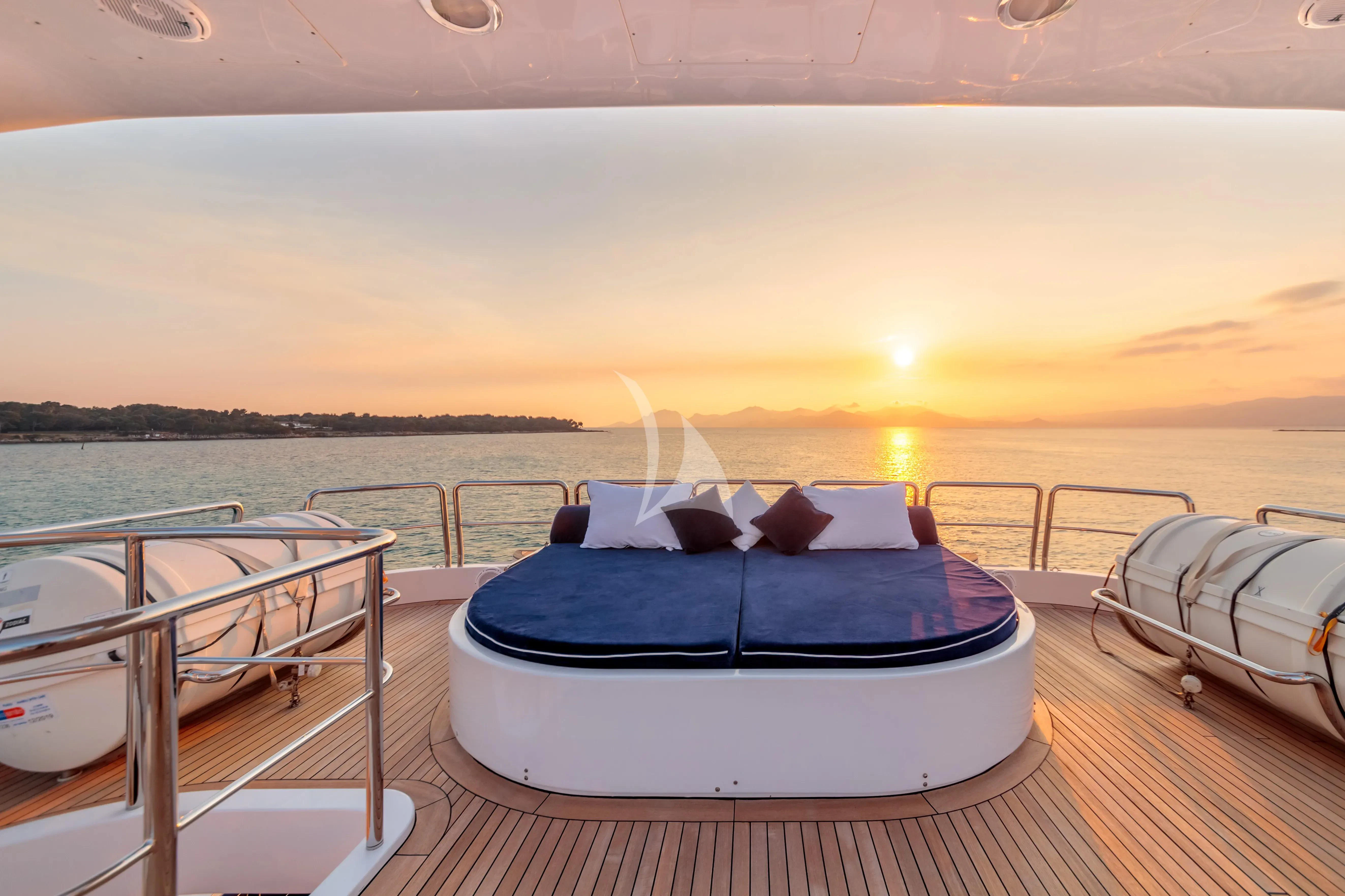 a boat on a deck aboard BANG! Yacht for Charter