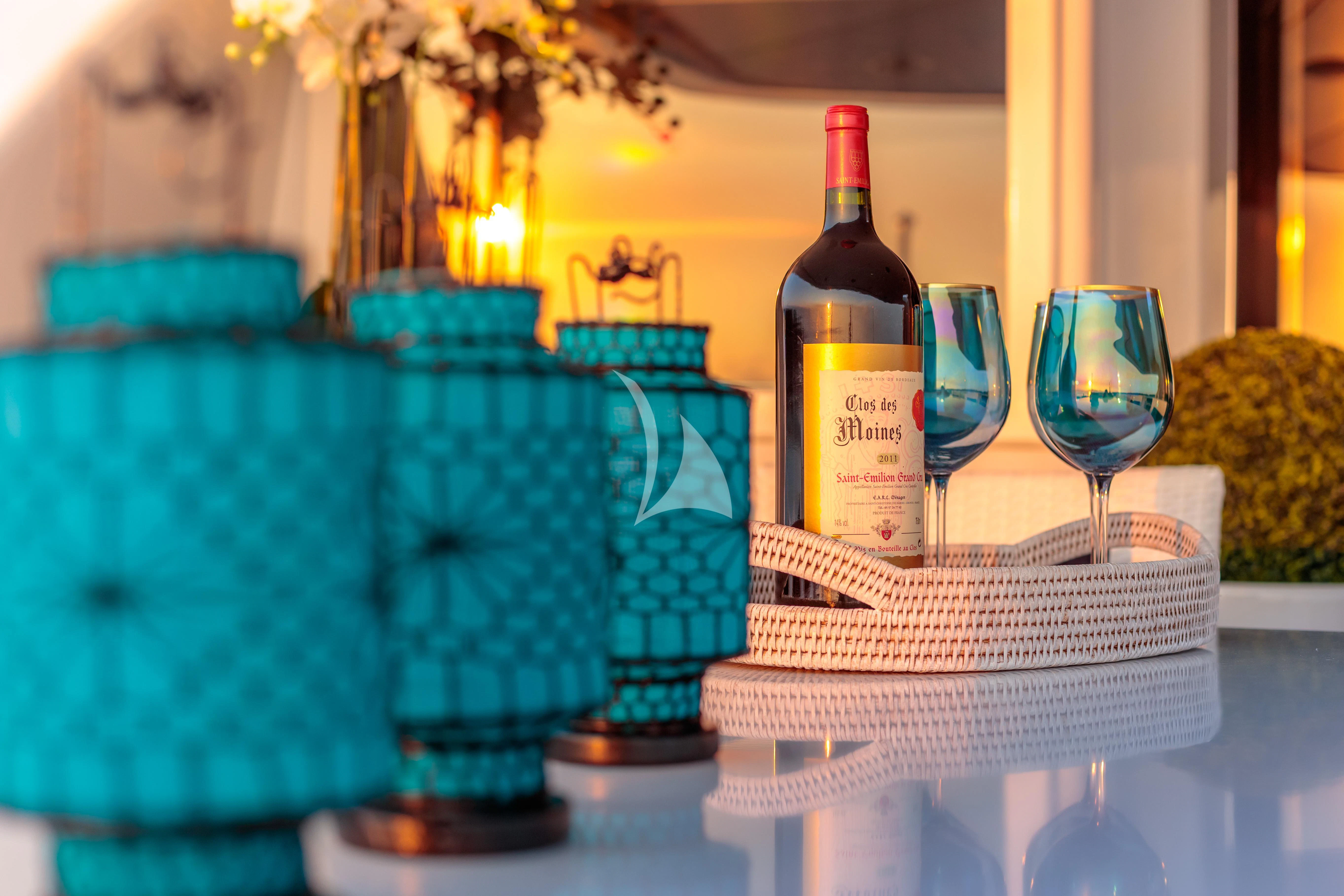 a table with many colorful objects on it aboard BANG! Yacht for Charter