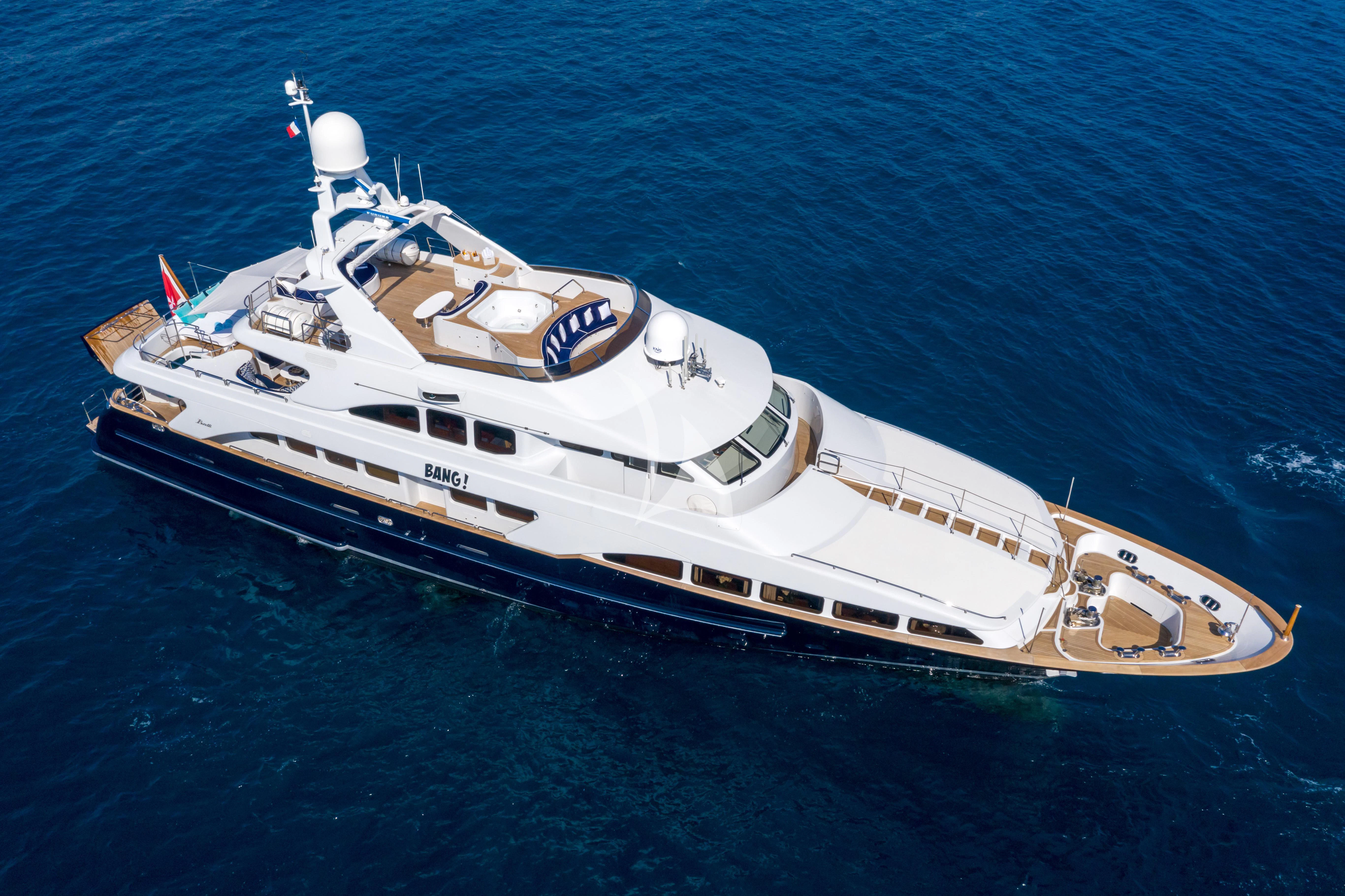 a large white ship in the water aboard BANG! Yacht for Charter