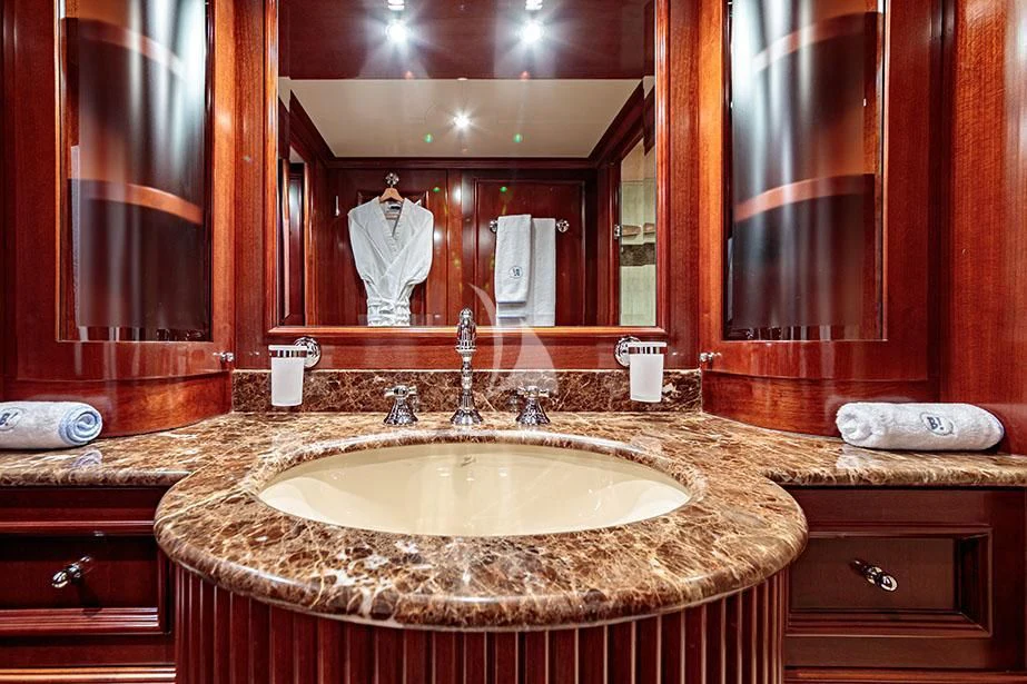 a bathroom with a large mirror aboard BANG! Yacht for Charter